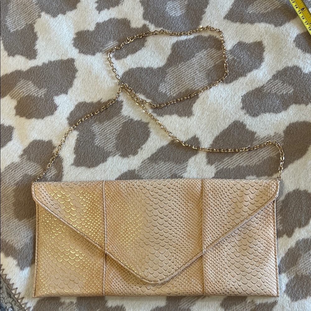 Elegant Tan Clutch with Gold Accents